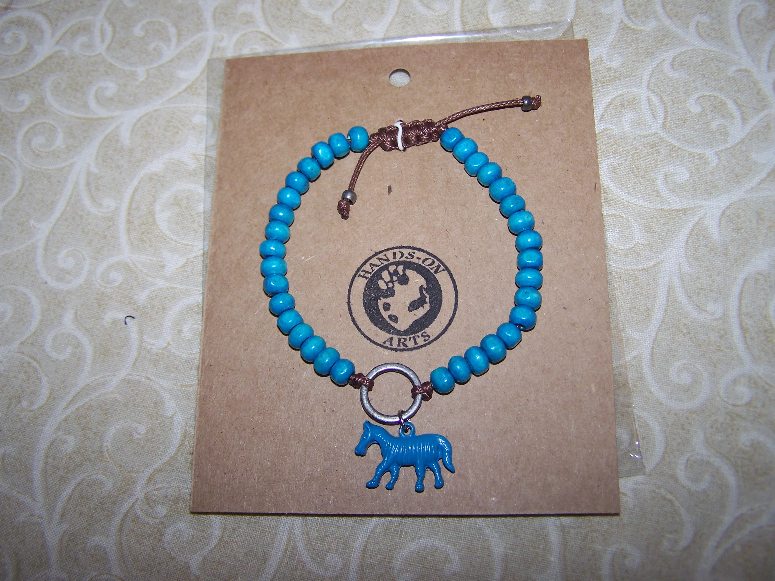 Beaded Bracelet with Wild Animal Charm