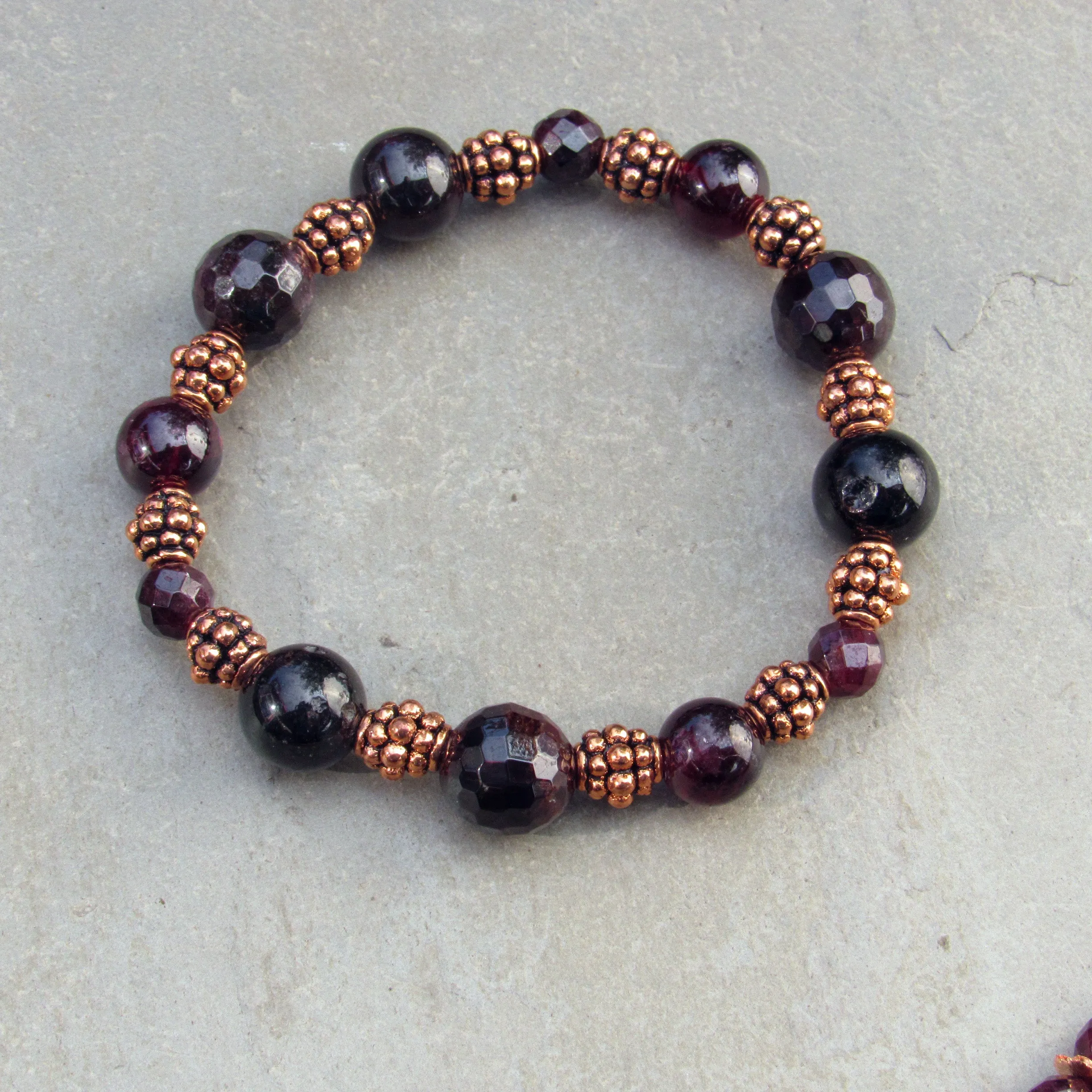 Garnet gemstone and copper stretch bracelet